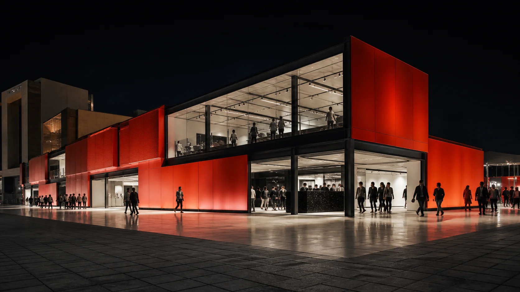 Large red modular exhibition pavilion illuminated at night